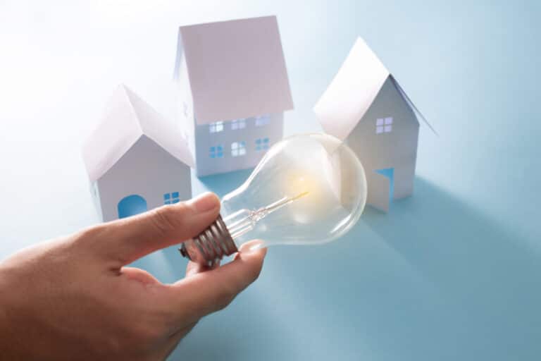 home energy with light bulb blue background sm
