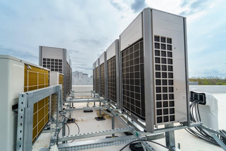 Commercial rooftop HVAC unit in Los Angeles being professionally serviced by certified technician