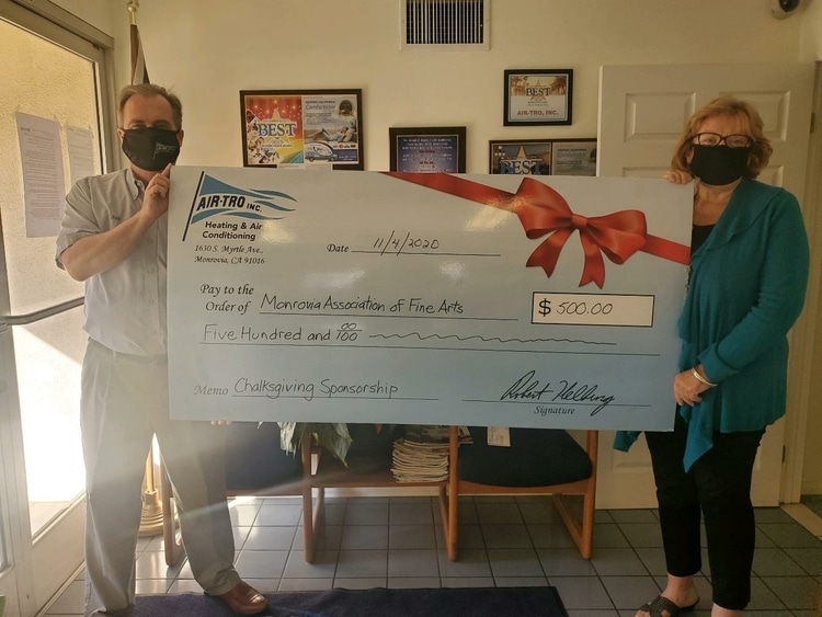 Christine Geltz of the Monrovia Association of Fine Arts stopped by to pick up the $300 donation for MAFA’s “Chalkdemic”
