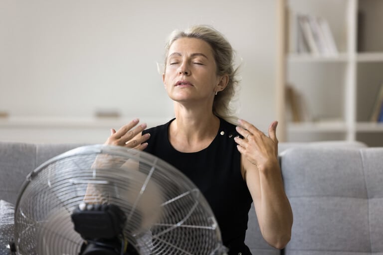 hot homeowner before Air-Tro technician performing professional AC repair on a residential system in Pasadena, California, 2026