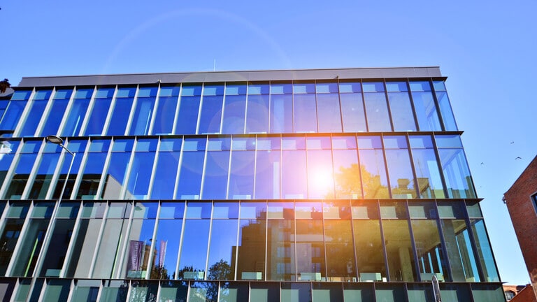 Modern commercial building exterior in Los Angeles with advanced building automation and HVAC controls for energy management