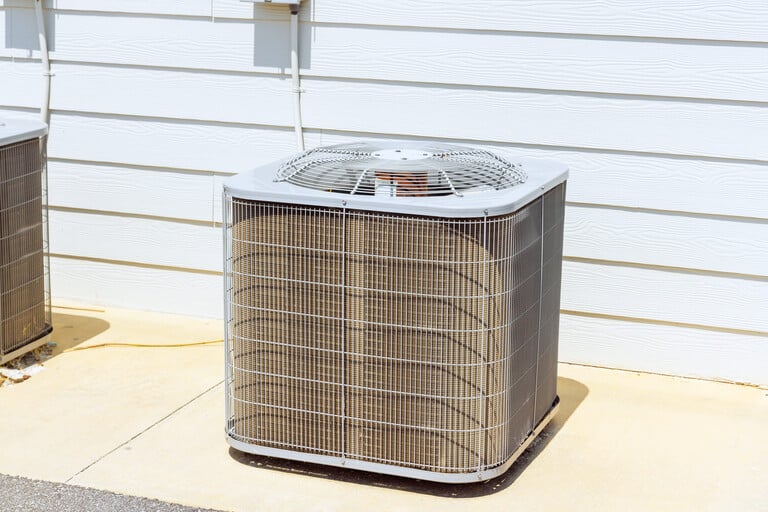 Pasadena homeowner reviewing honest options for residential HVAC repair versus replacement with a local Air-Tro comfort consultant